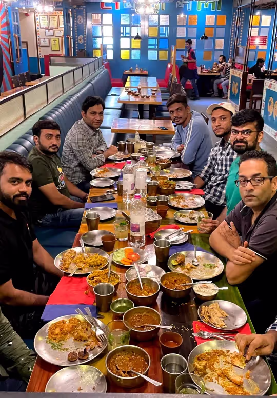 Alchemy Tech team members enjoying a meal together