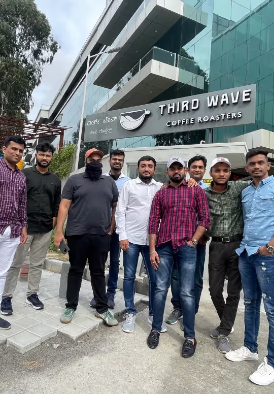 Alchemy Tech team outside the Third Wave Coffee Roasters office